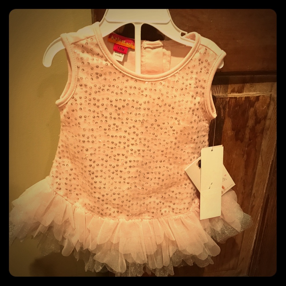 Adorable sequined onesie with small tutu. NWT!